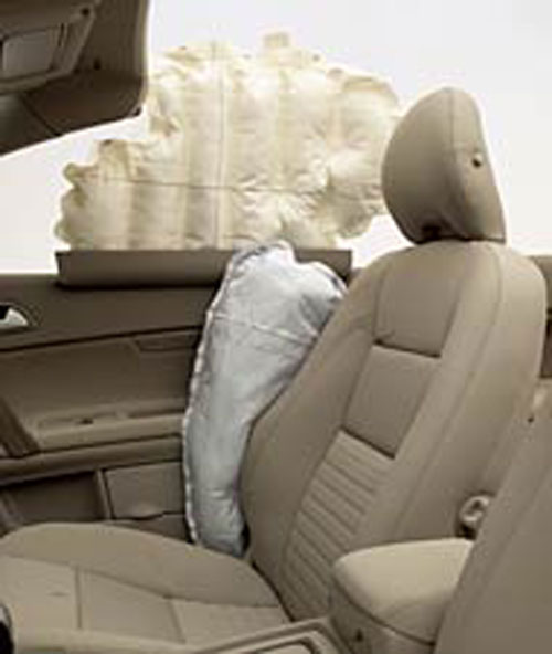 Door- and seat-mounted airbag