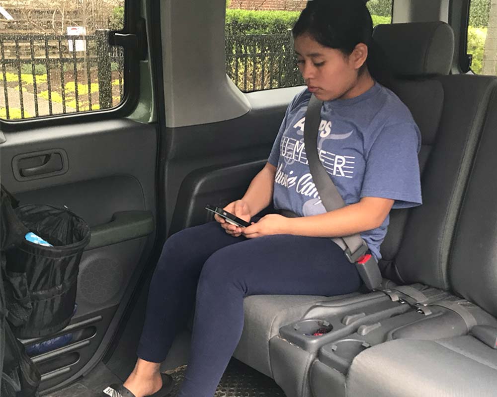 Older child using adult seat belt